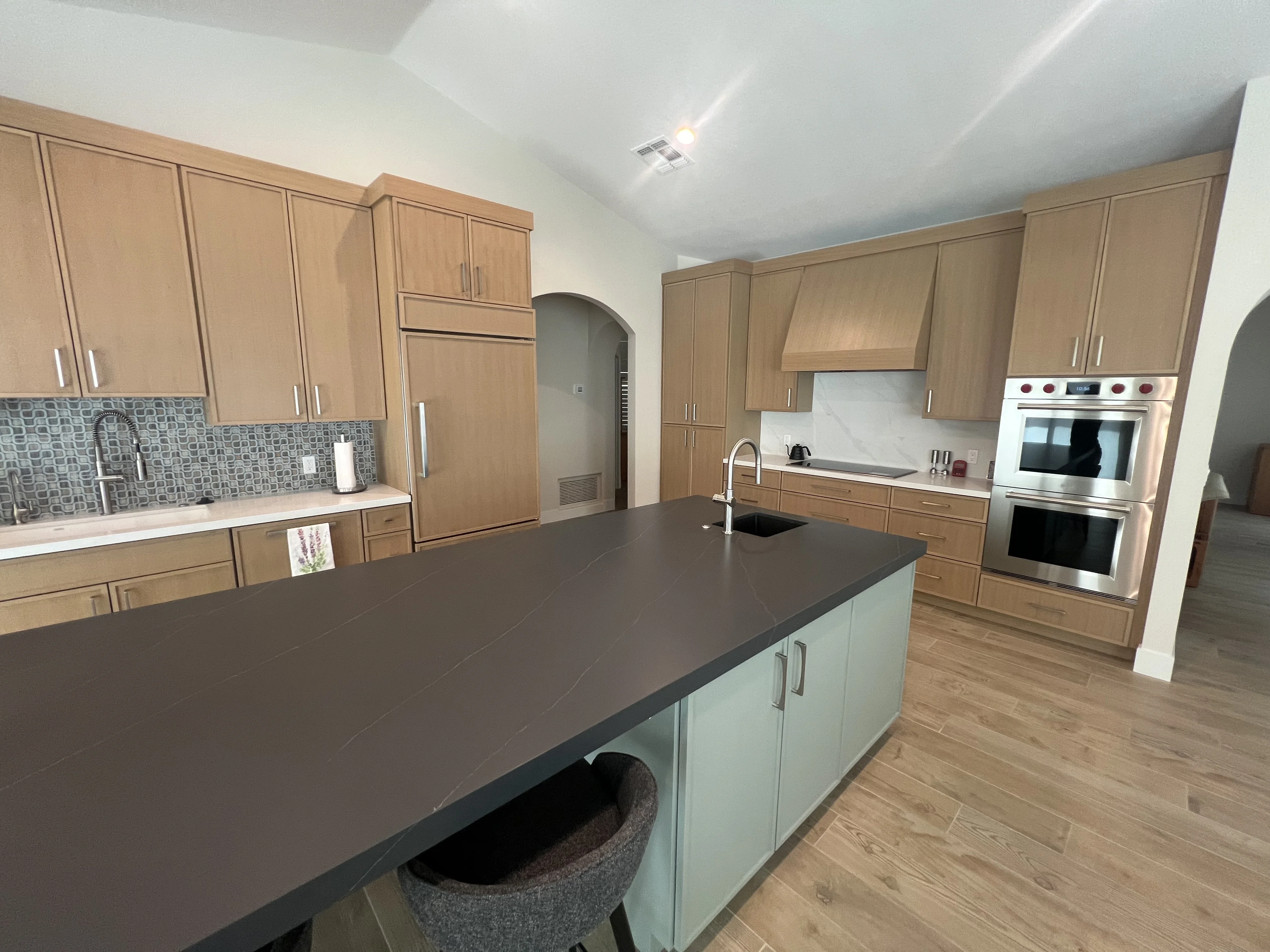 Painted island rift white oak thin shaker kitchen