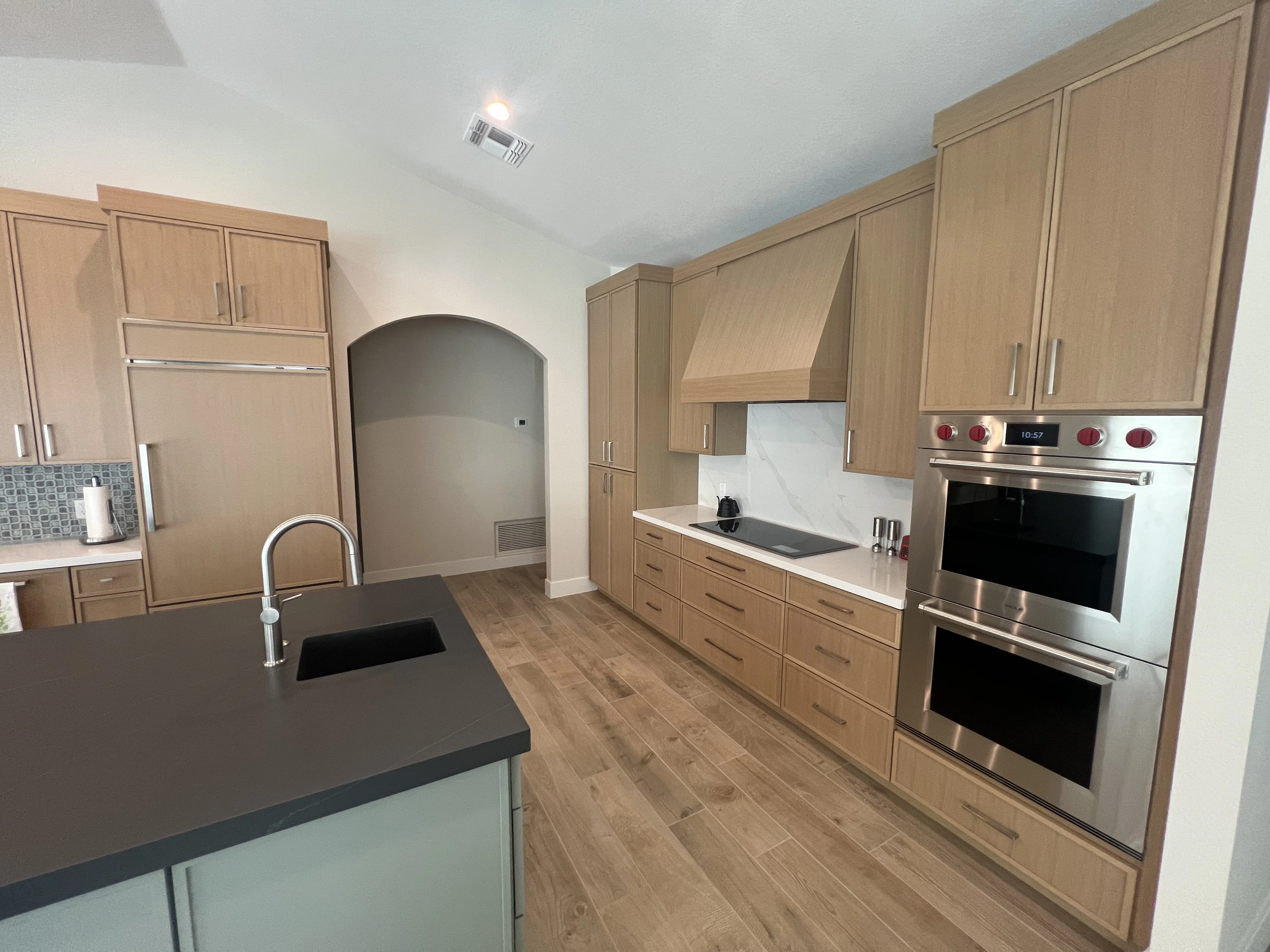 Painted island rift white oak thin shaker kitchen in Rio Verde, AZ