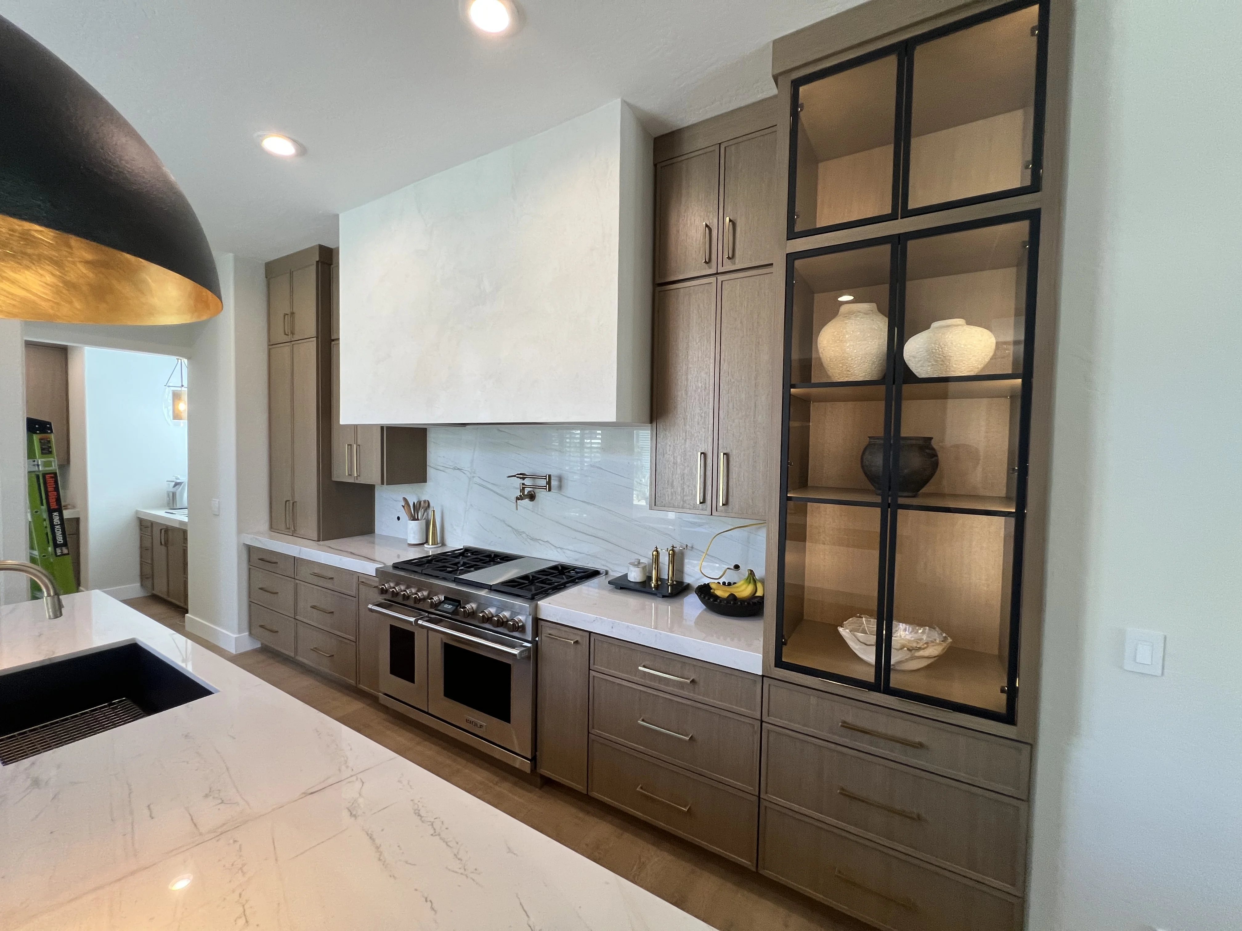 Rift white oak thin shaker iron doors kitchen in Scottsdale, AZ
