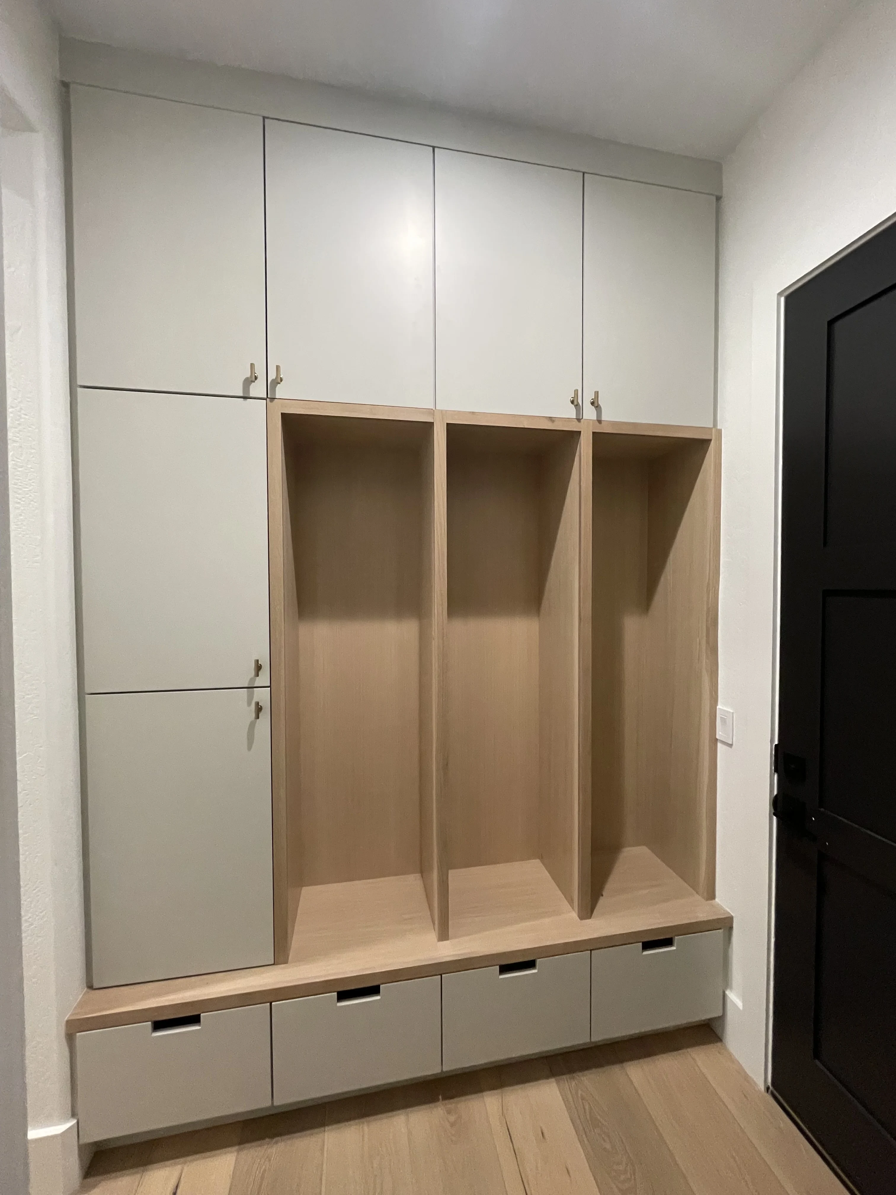 Painted slab white oak interiors mud room in Scottsdale, AZ